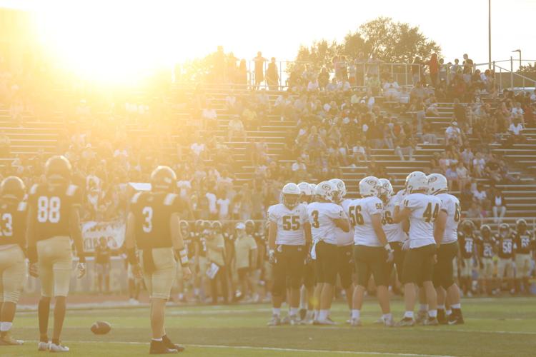 Gretna offense huddles