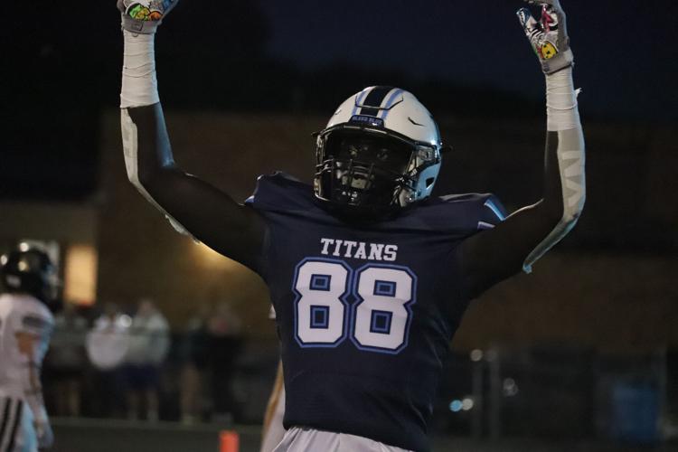 Titans top Rams in key district opener