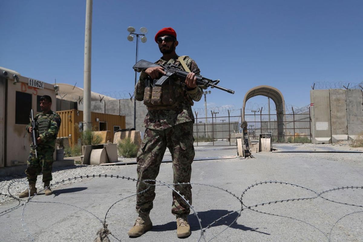 An Afghan National Army soldier stands guard at Bagram Air Base, after all US and NATO troops left, some 70 Km north of Kabul on July 2, 2021.