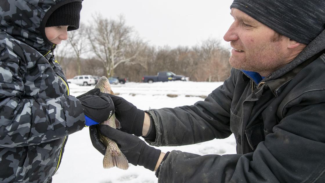 9 photos of Iowa DNR's winter trout stocking at Big Lake Park Gallery