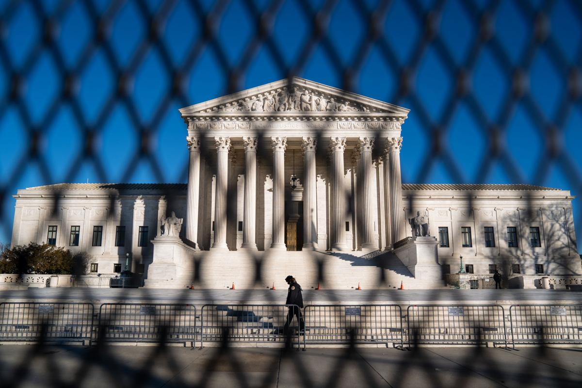 Heightened security measures are in place around the Supreme Court, days after a violent mob of President Donald Trump's supporters swarmed the U.S. Capitol, disrupting Congress' vote to certify the 2020 election results, on Saturday, Jan. 9, 2021, in Washington, D.C..