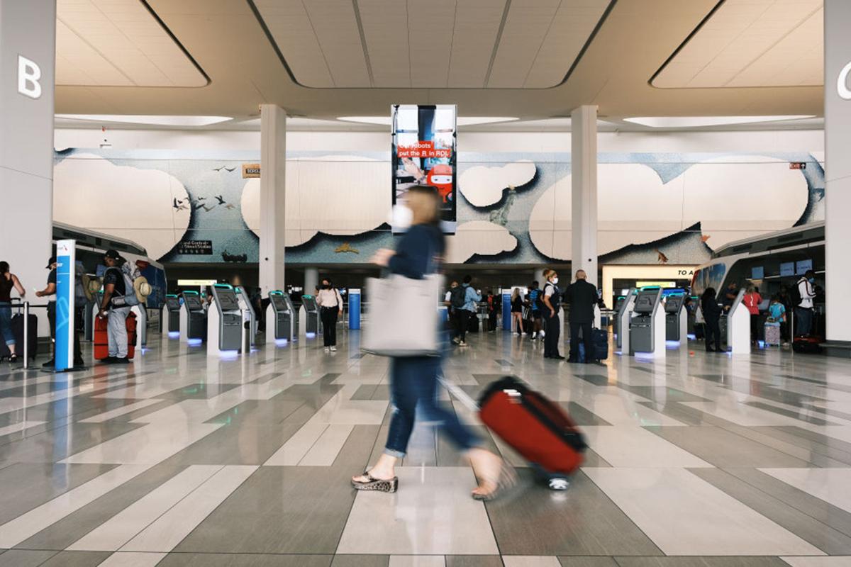 People move through LaGuardia Airport before the start of the Fourth of July weekend on July 2, 2021 in New York City.