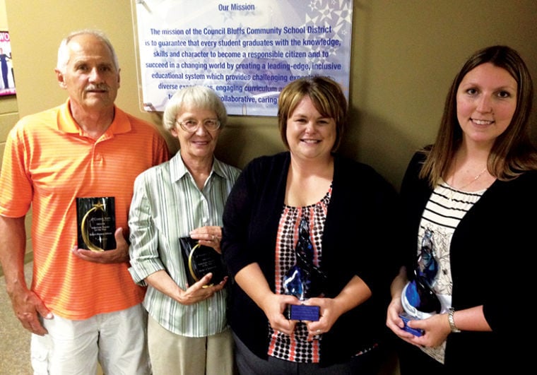 Teachers, staff recognized by school board