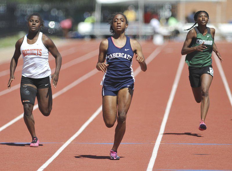 Southmoore guts out state titles; Area finishes 12 in girls long jump