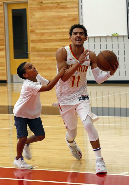 Trae Young went with suit shorts for draft