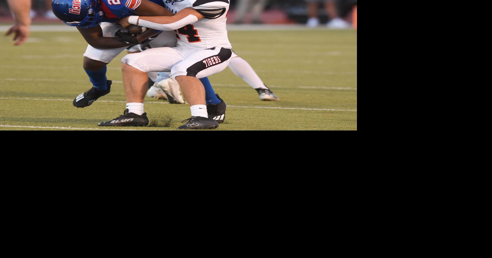 Prep football: Tigers struggle to limit big plays in loss to Moore ...
