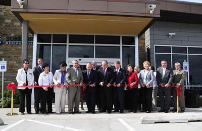 nation chickasaw clinic normantranscript pharmacy officially tribal leaders ribbon foot cut square care open