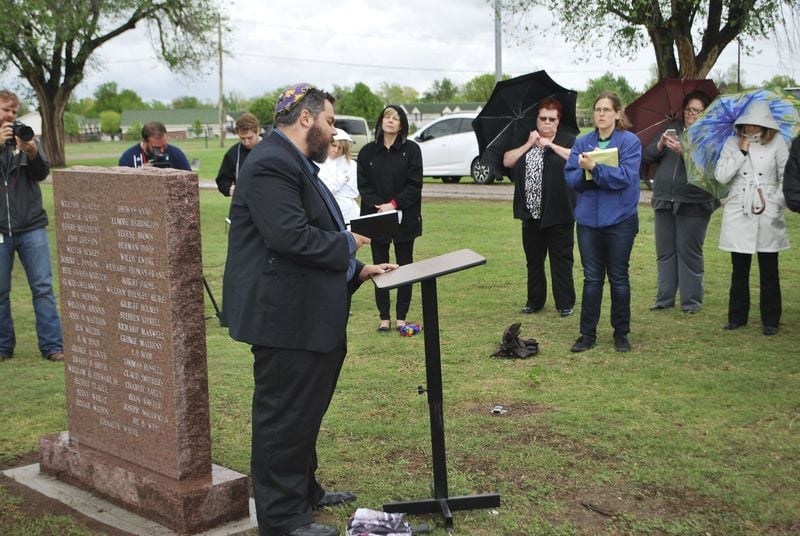 Memorial for mass grave unveiled on 97th anniversary of blaze 