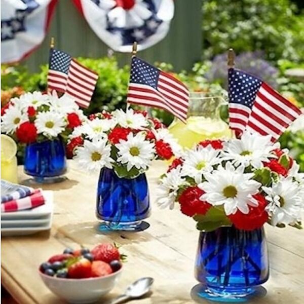 Red white and store blue flowers