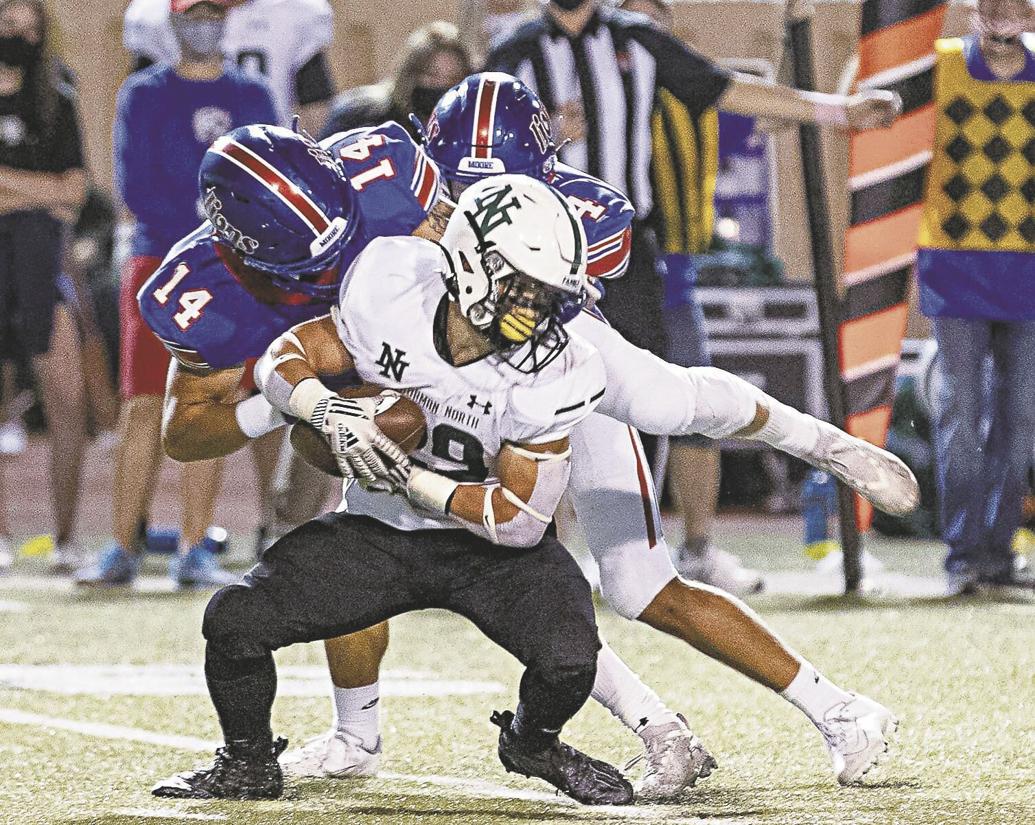 Norman North footballTimberwolves hold off Moore's comeback