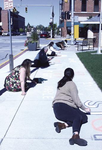 CCFA writes messages in chalk for Domestic Violence Awareness Month ...
