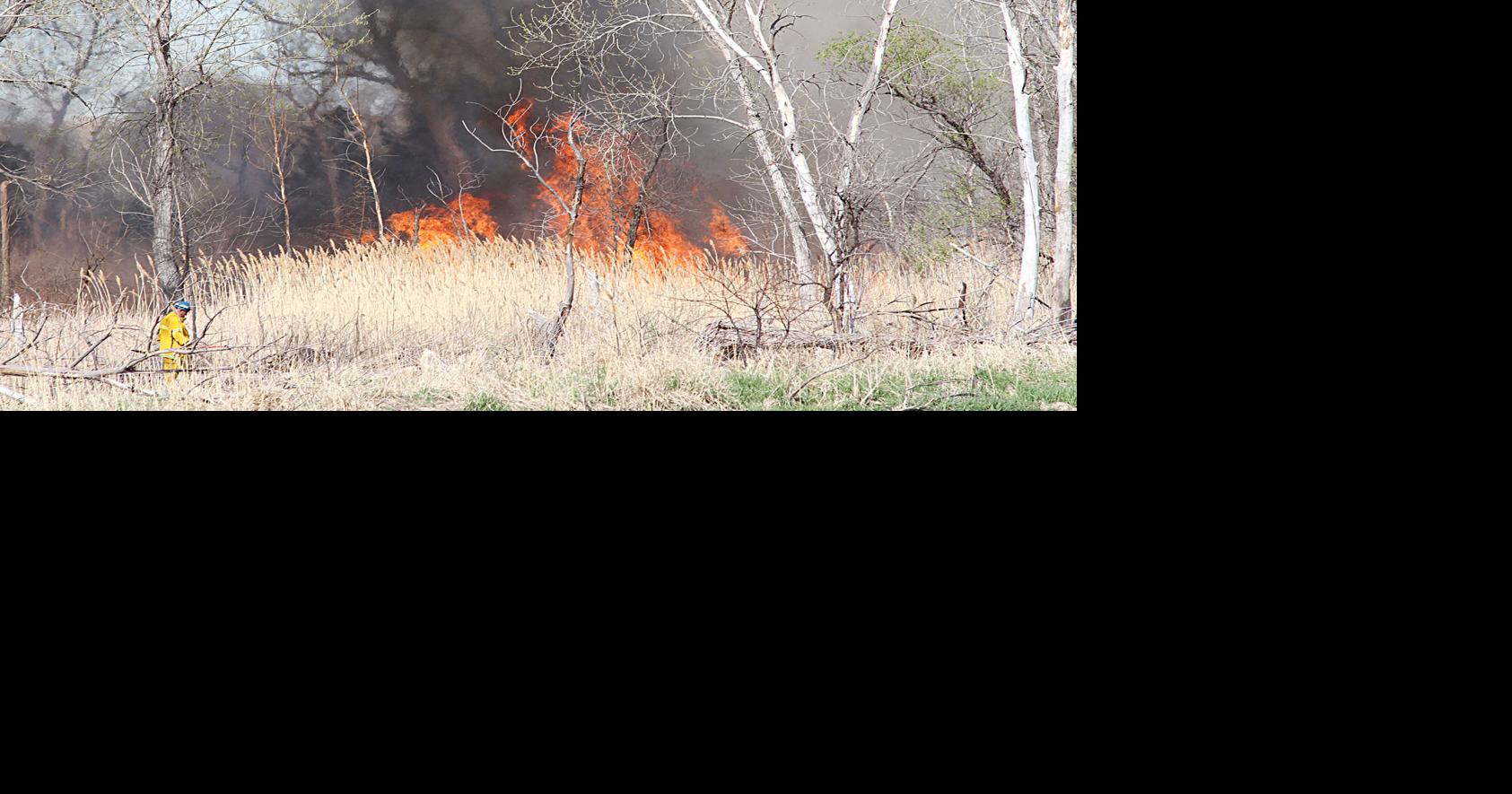 Fire near river burned 5 acres