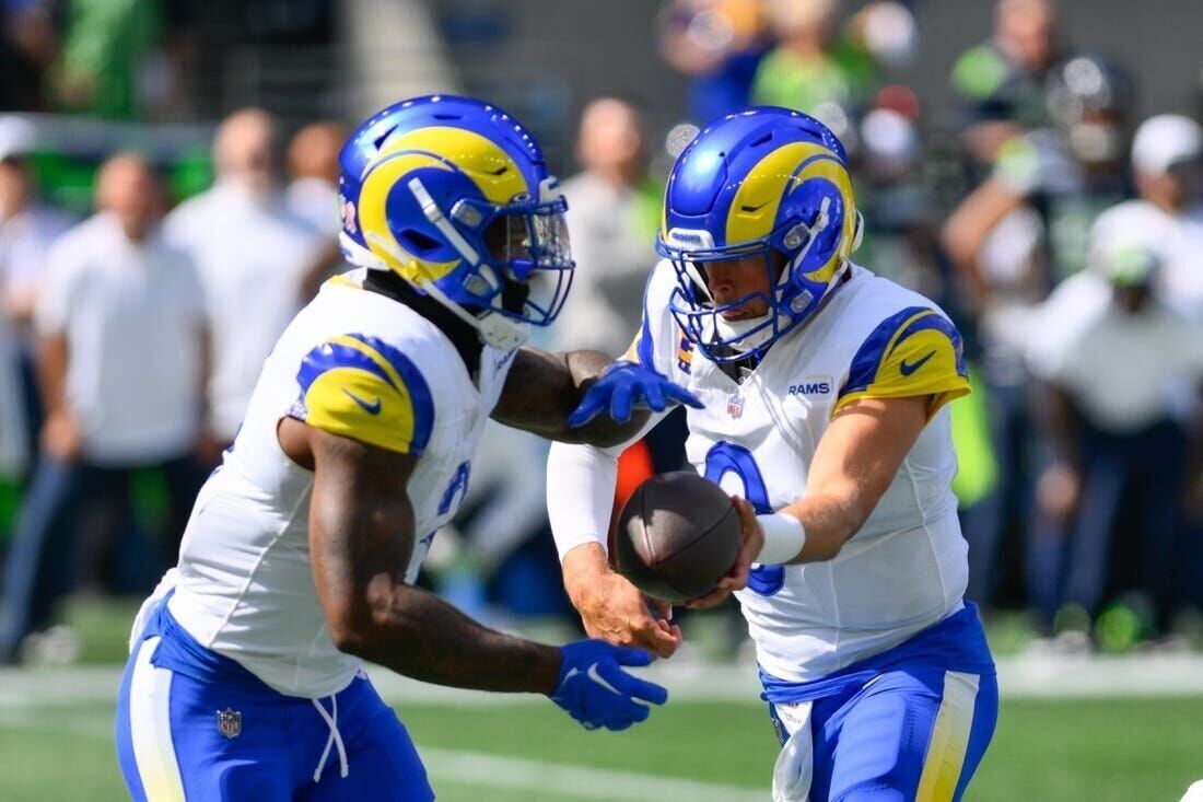 Los Angeles Rams running back Cam Akers fights through contact for a  12-yard gain