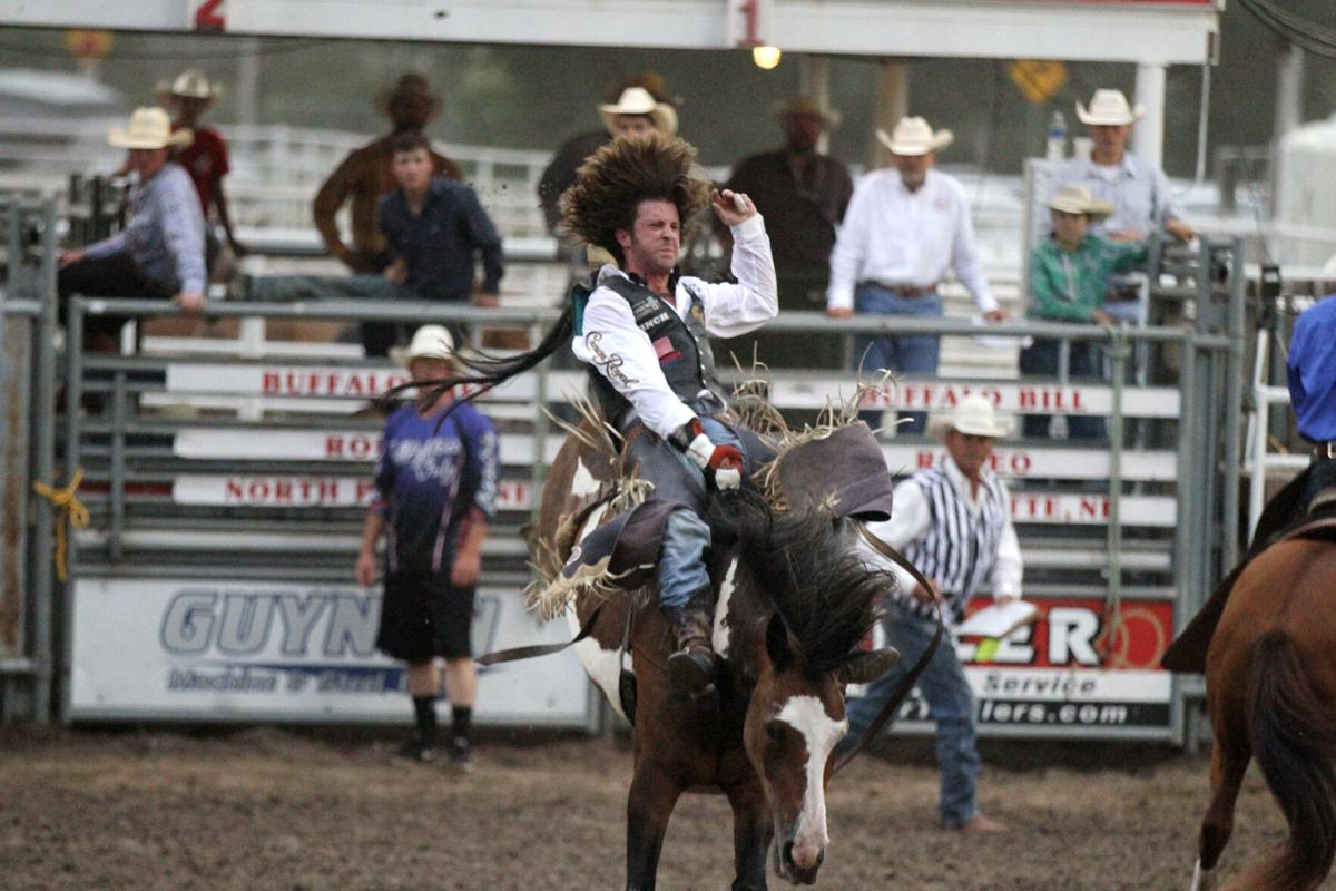 Texas cowboy ties arena mark in bareback on final night of Buffalo Bill Rodeo