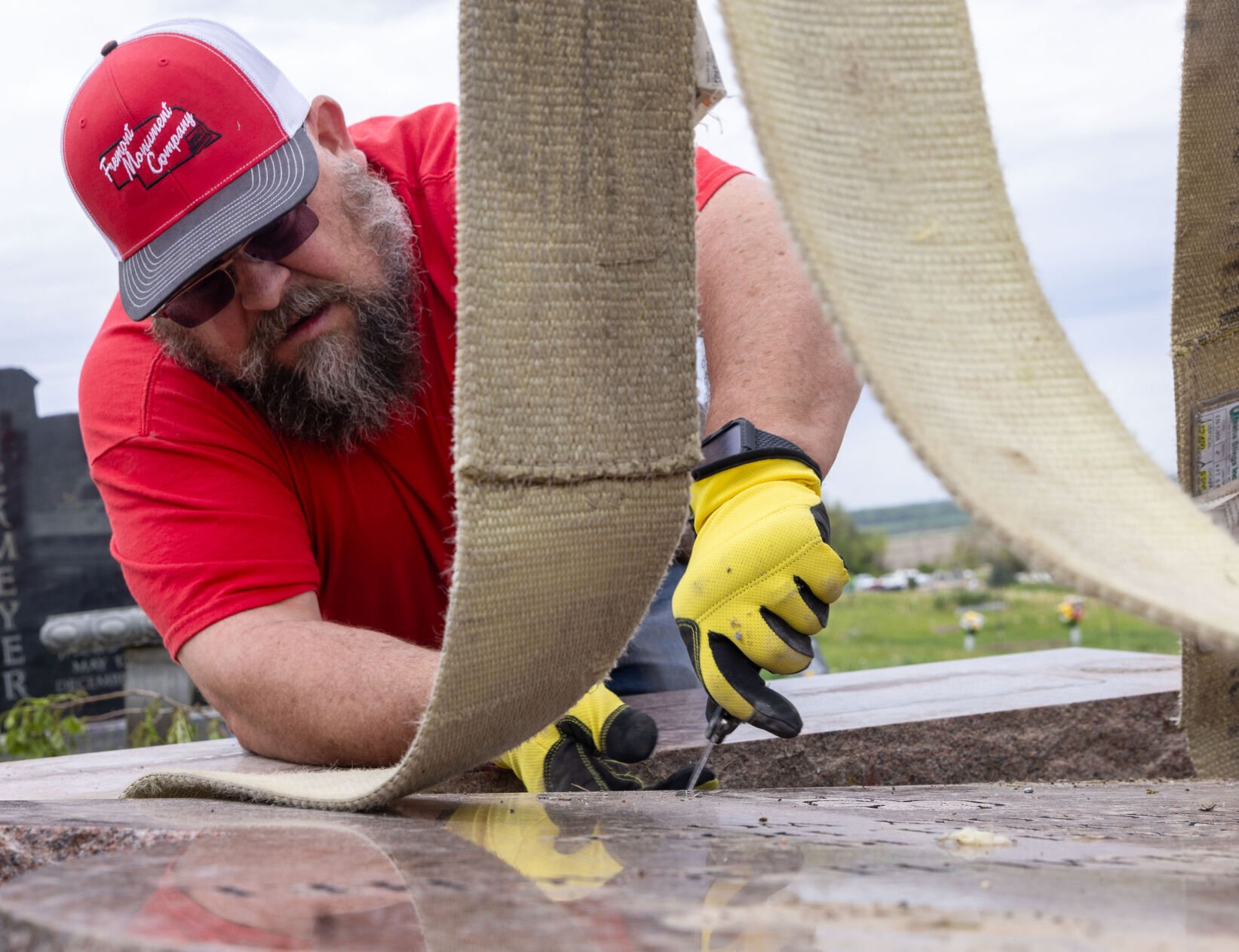 Omaha area workers repair tornado damage at Elkhorn cemetery