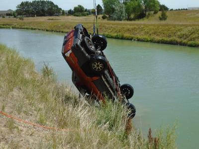 Teens suffer minor injuries after driving car into canal