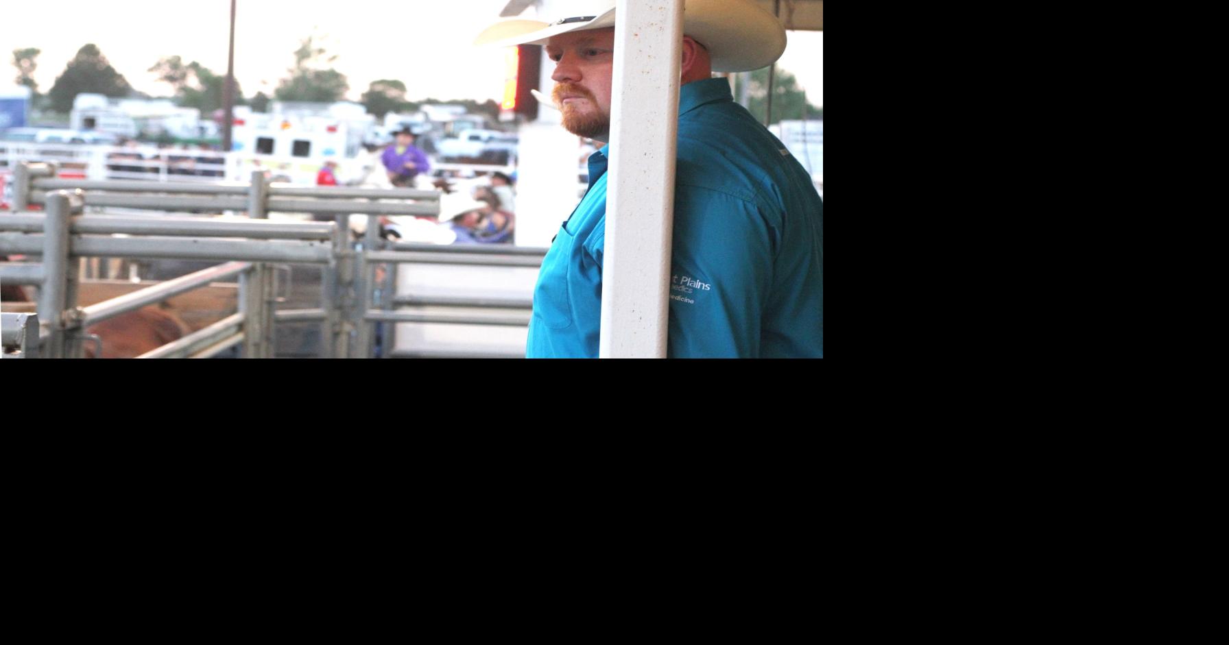 Medics patching up rodeo cowboys