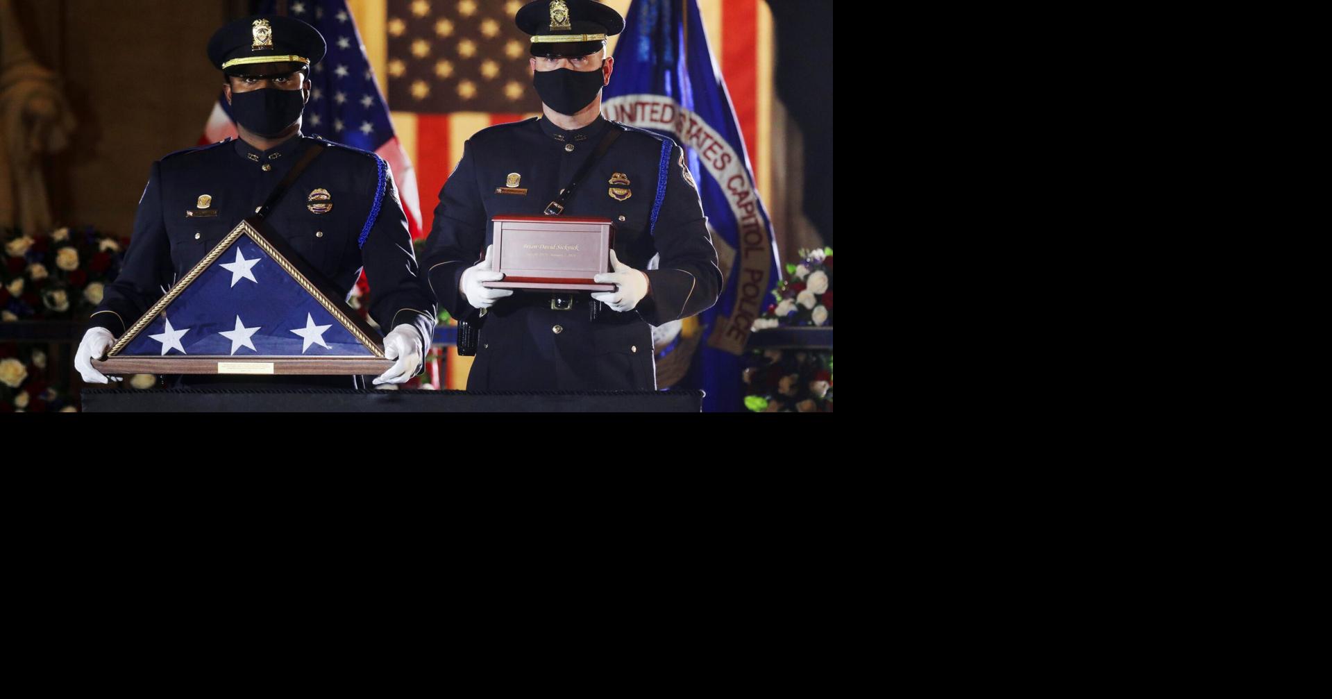 Photos: Capitol officer who died after riot lies in honor in Rotunda