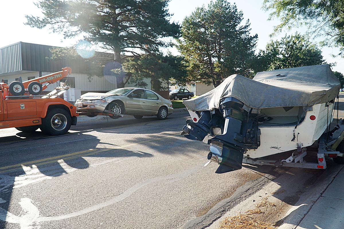 Thursday collision totals car and boat