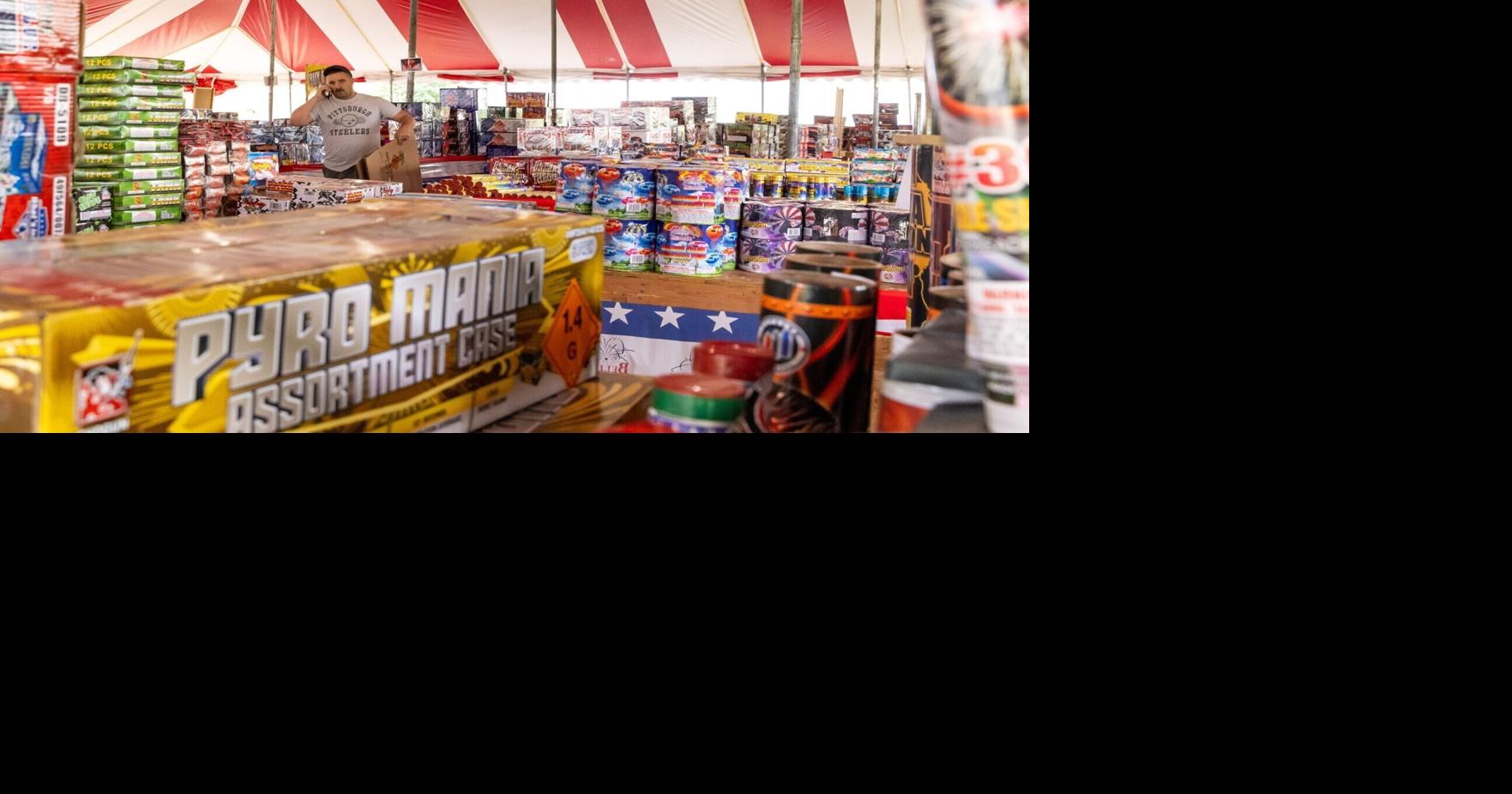 Photos: Employees prepare a Bellino Fireworks stand