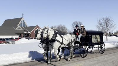 Funeral procession led by horse drawn carriage Saturday in North Platte