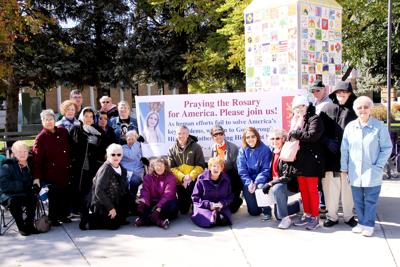 Catholics gather to pray rosary Saturday