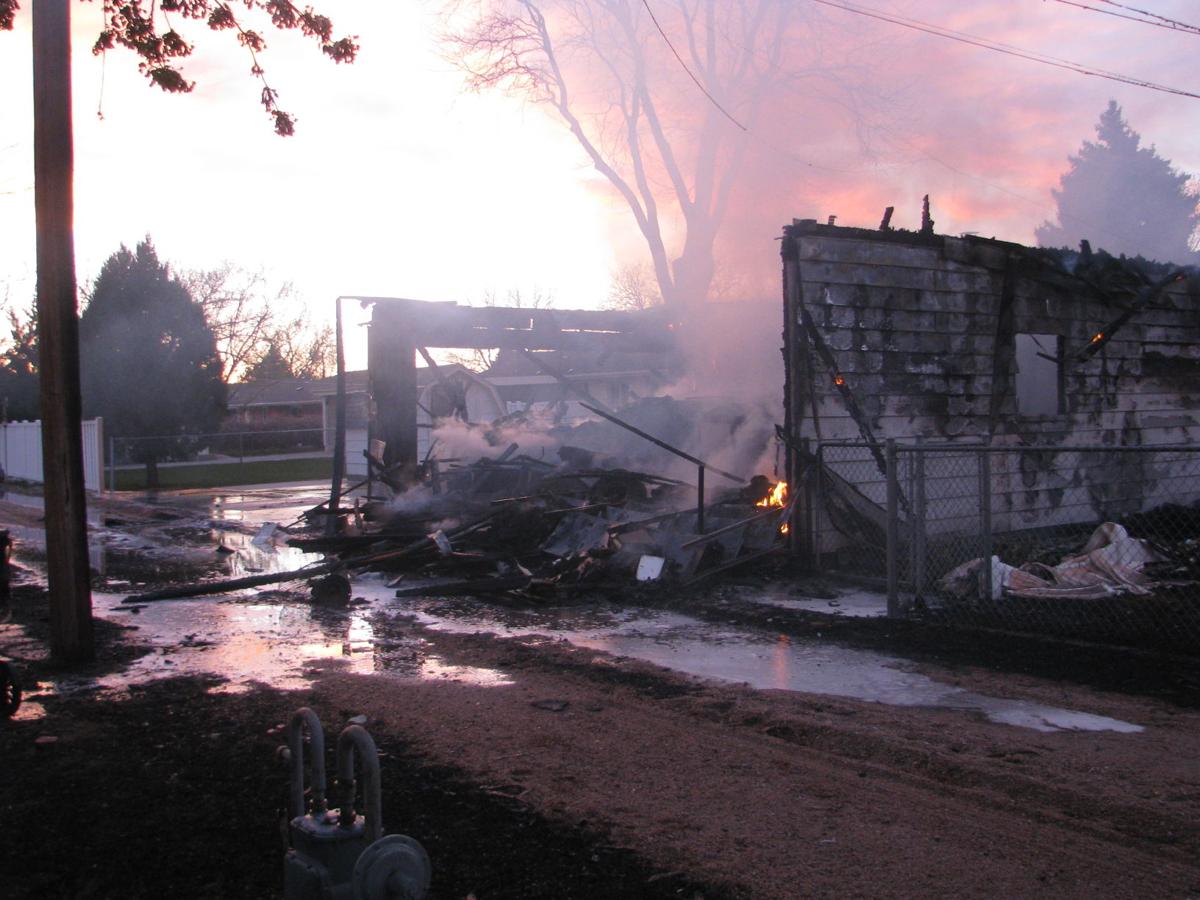 Explosions, fire destroy garage on West E Street Breaking News