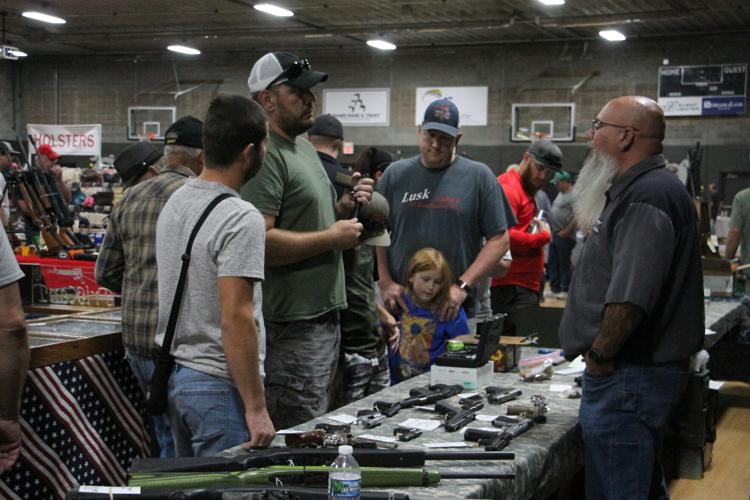 Sportsmen shop guns and knives at annual show