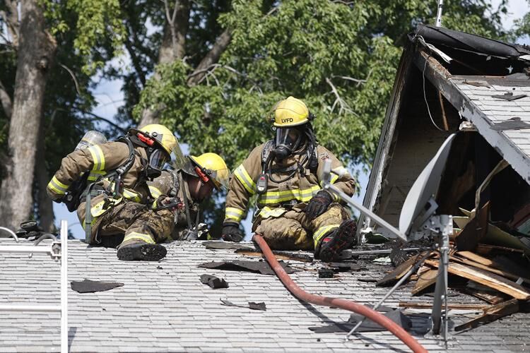House fire caused by attic fan summons Overton and Lexington fire  departments