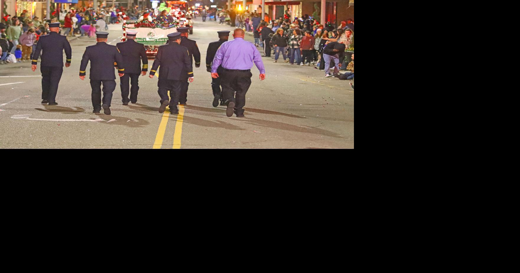 Crowds pack downtown Whiteville for nighttime Christmas parade News