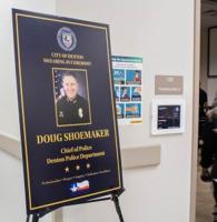 A sign for the chief of police swearing-in ceremony stands in the hallway of the Public Safety Training Center on Oct. 3, 2022. Photo by Kelly Tran
