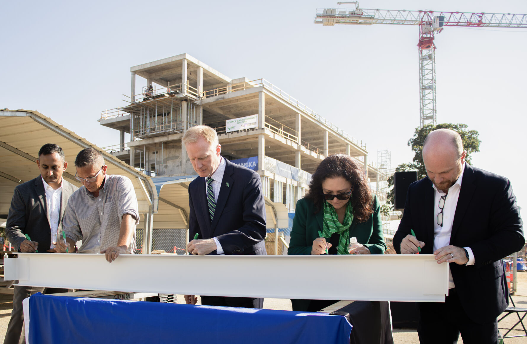 New building reaches construction milestone | News | ntdaily.com