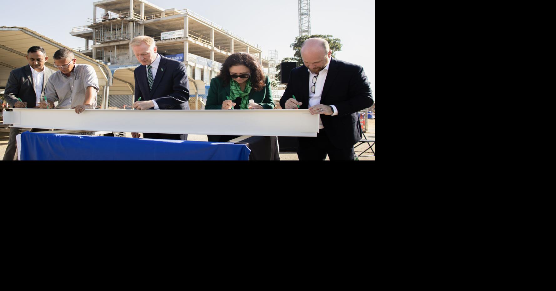 New building reaches construction milestone | News | ntdaily.com