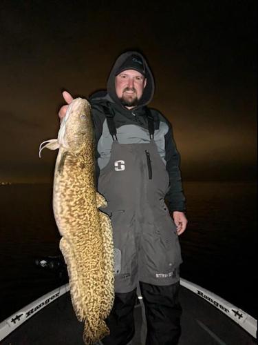 Chesterton man catches record fish in Lake Michigan