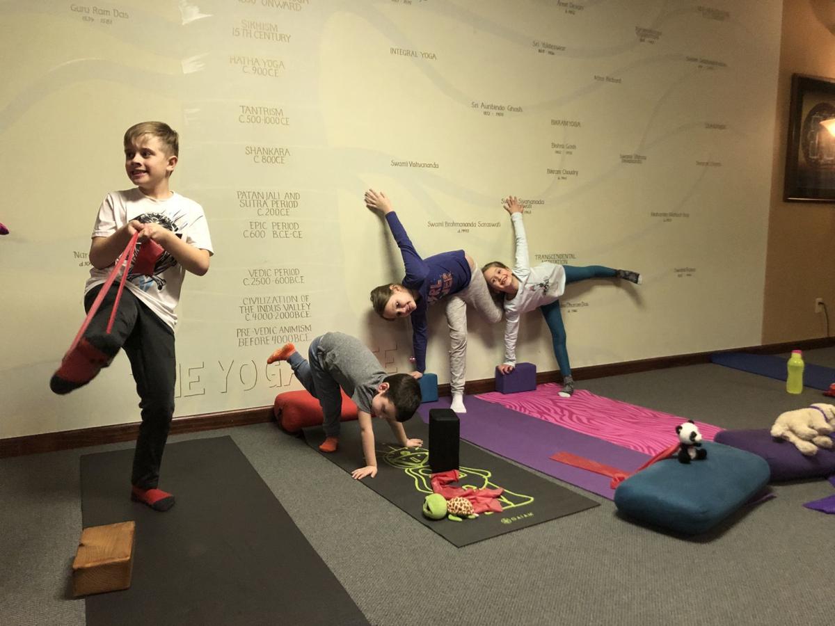 'Downward dog' good for kids' health, peace, too: Yoga for ...