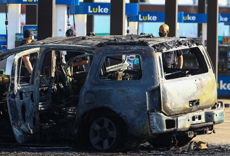 Woman dies after fiery crash into gas pump