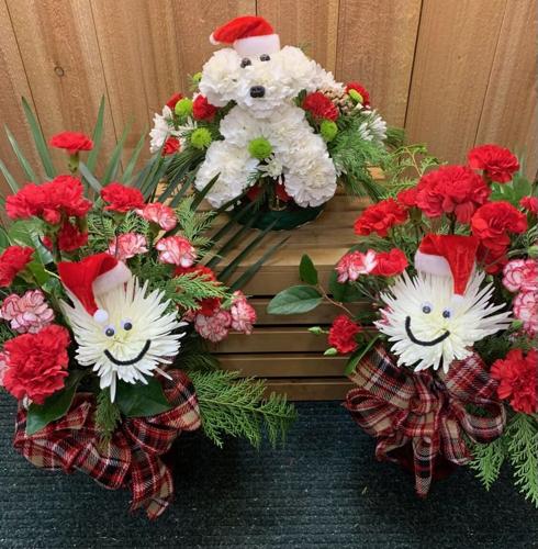 Florists start with the green and add the feelings to create holiday magic