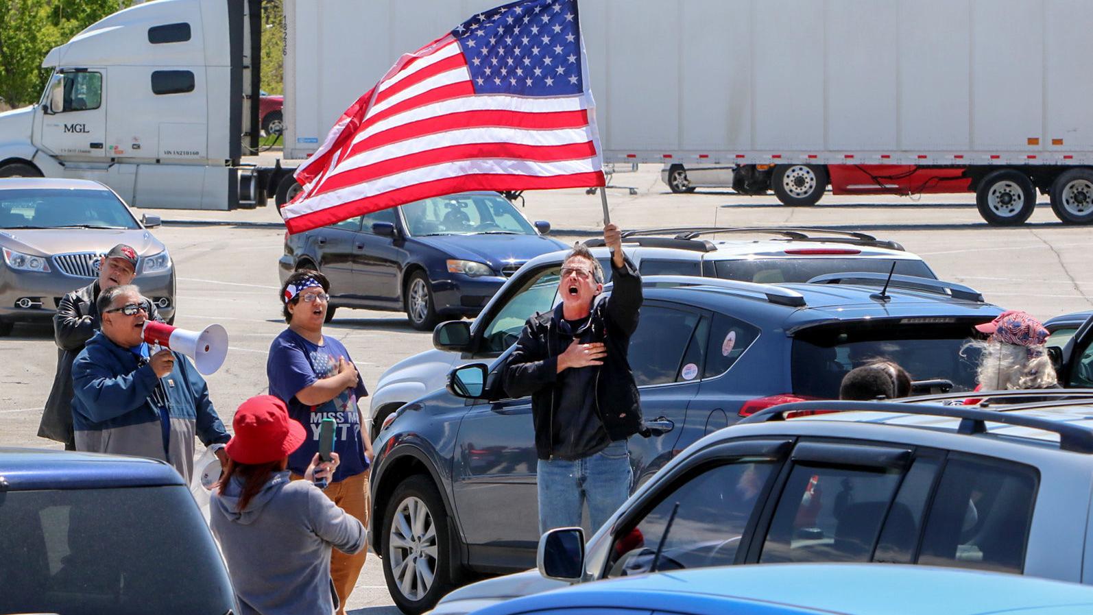 WATCH NOW: Trump supporters caravan outside Hammond mayor's house in protest over flag dispute - Vimarsana News