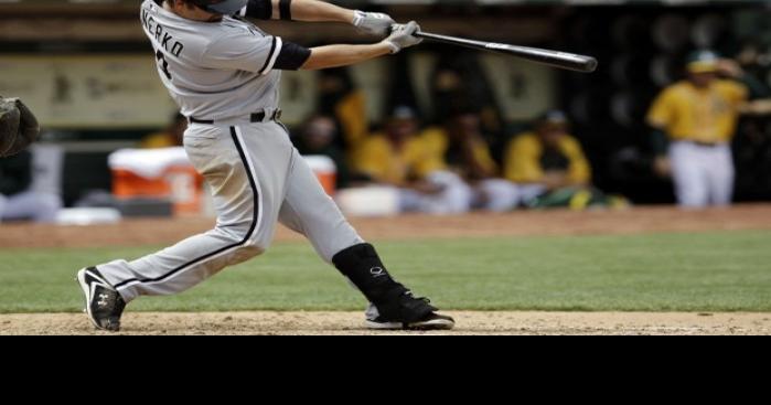 A look at Paul Konerko's first and last MLB home runs 