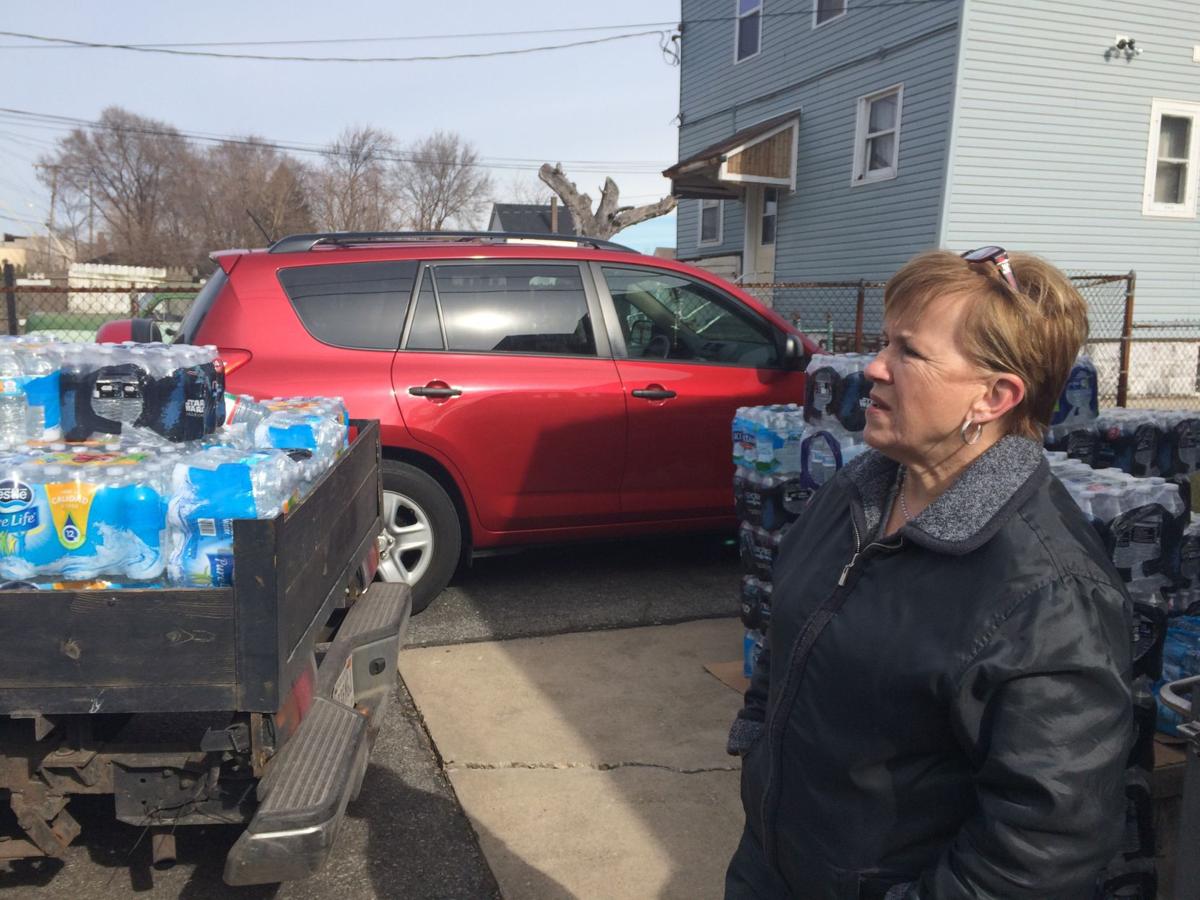 Volunteers deliver safe drinking water to Superfund residents