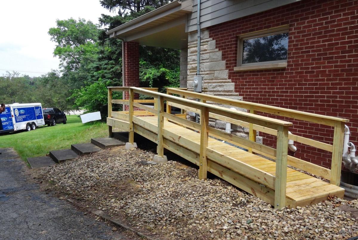 UAW volunteers build wheelchair ramp for youngster | Schererville News ...