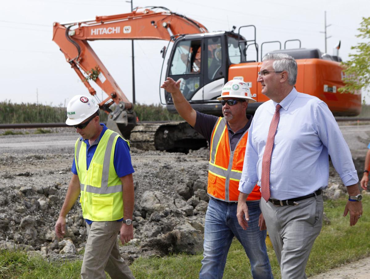 Eric Holcomb visits Calumet and 45th Avenue construction site