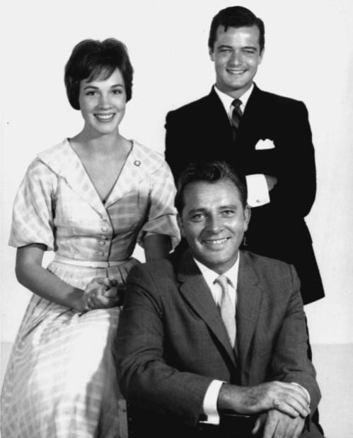 Julie Andrews Robert Goulet and Richard Burton seated in 1960