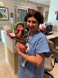 Babies don Baby Yoda caps at Franciscan Health hospitals