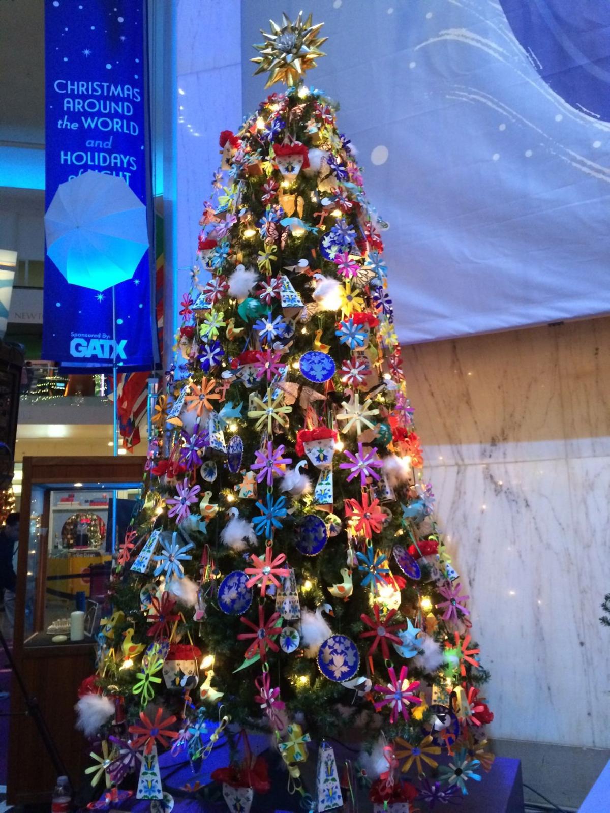 Trees aglow Christmas Around the World, Holidays of Light star again