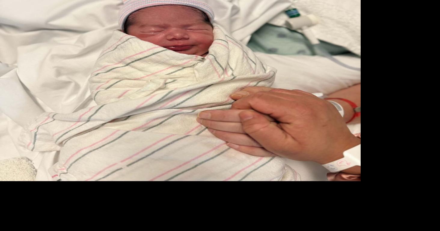 Brain-injured dad meets newborn son as Region family faces heartbreaking goodbye