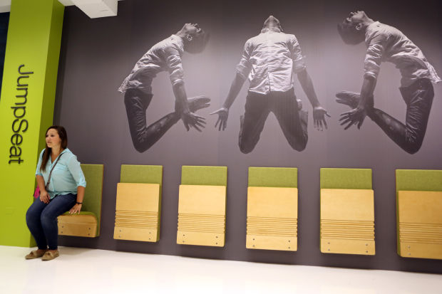 Tear down that cubicle wall, office furniture designers say
