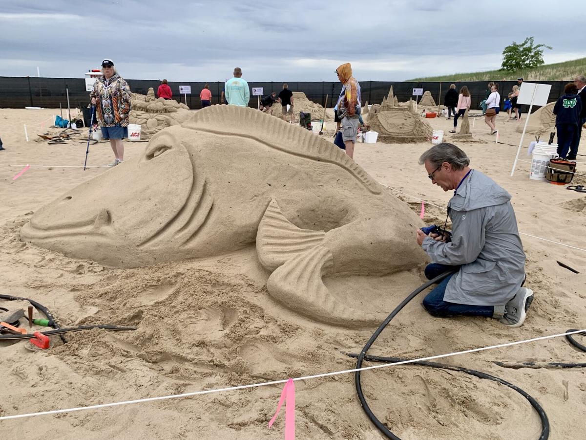 Artists come from all over to create works of art in Michigan City's  'singing sands', Local News