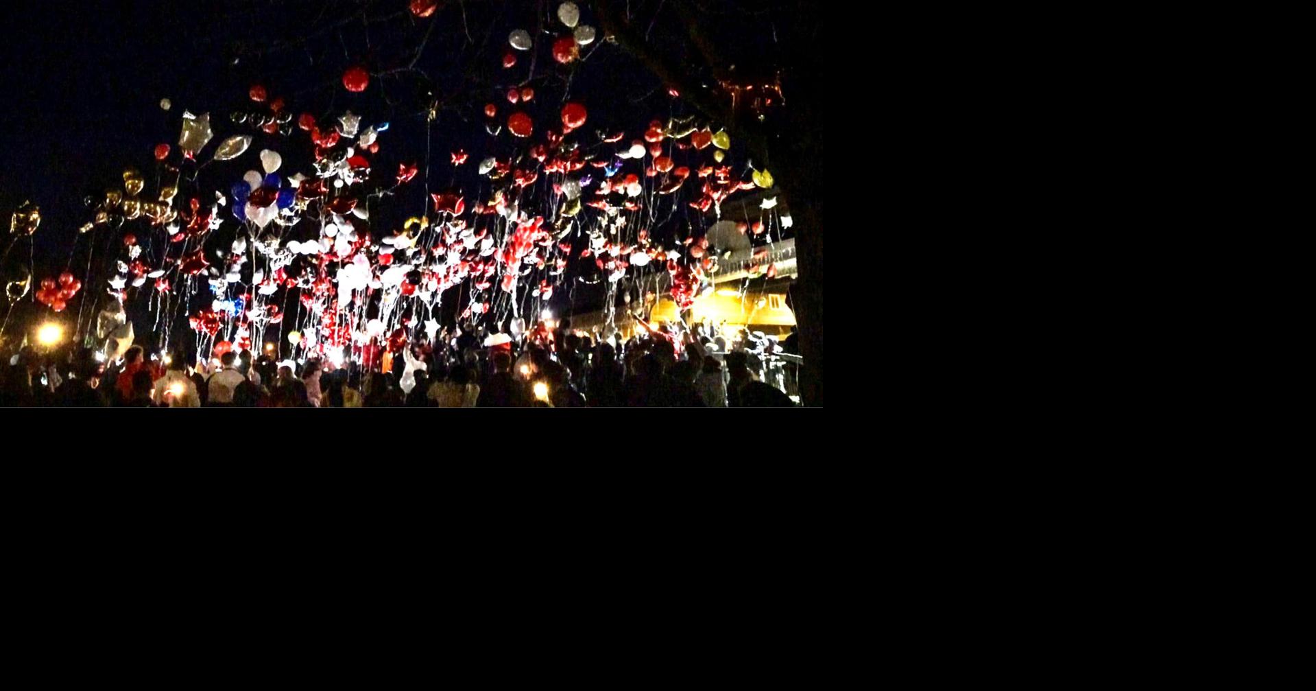 Loved ones hold balloon release, candlelight vigil to remember slain