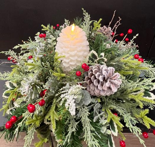 Florists start with the green and add the feelings to create holiday magic